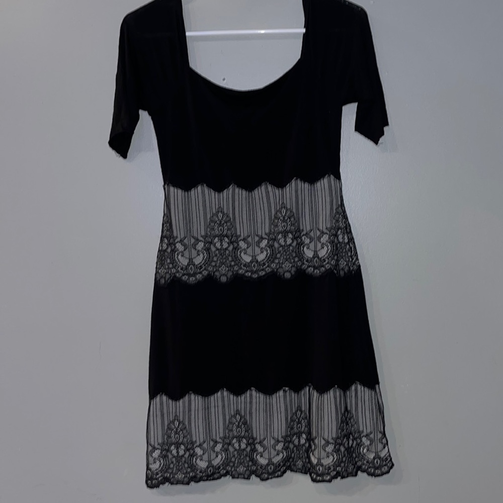 Ladies size 8 black knit dress with lace